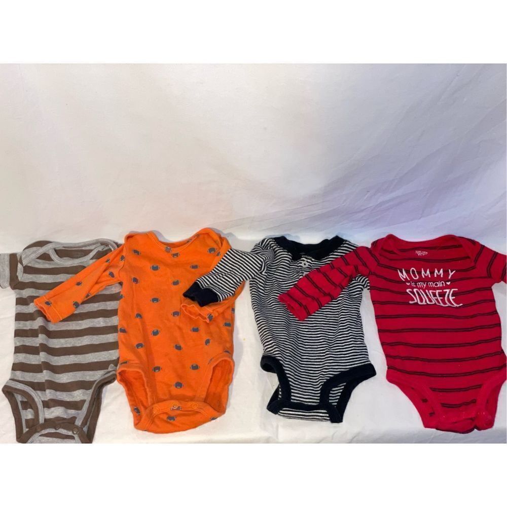 4 Carter’s body suits 